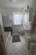 3-Zimmer-Wohnung im Erdgeschoss mit Balkon in Linden – Anmietung nur mit WBS - Badezimmer.jpeg